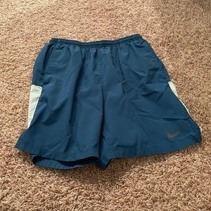 NIKE DRI FIT TEAL AND MINT GYM SHORTS SMALL